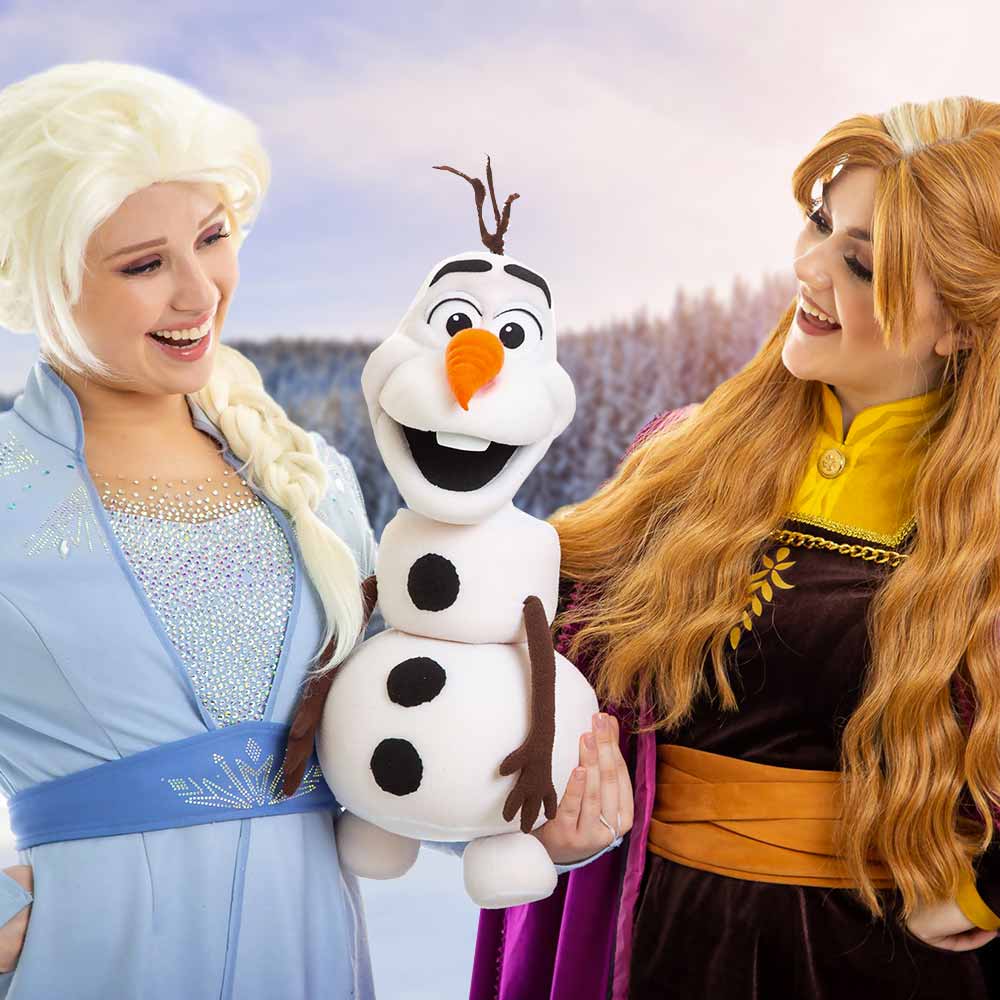 Snow Sisters with a Snowman